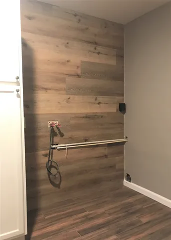 a view of a room with racks on the wall