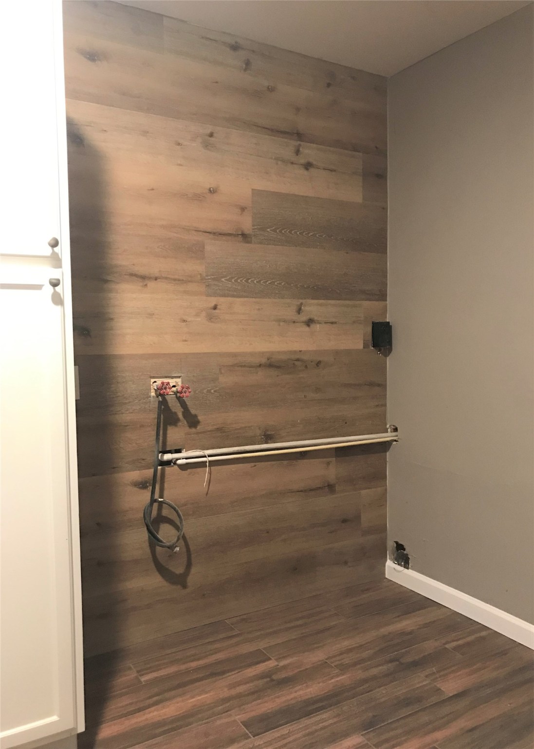 7314 Werner Street Houston, TX 77076 - Photo 5 of 9 a view of a room with racks on the wall