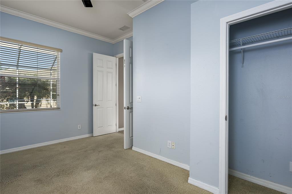 12150 Mapleridge Drive Parrish, FL 34219 - Photo 16 of 38 a view of an empty room with a window