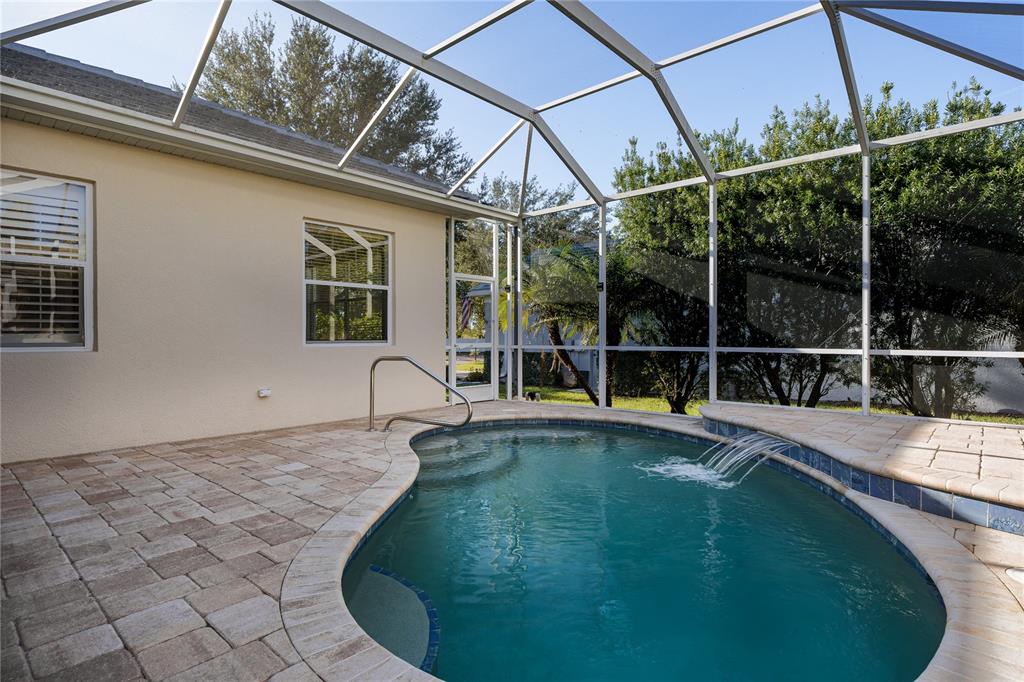 12150 Mapleridge Drive Parrish, FL 34219 - Photo 20 of 38 a view of a house with a swimming pool