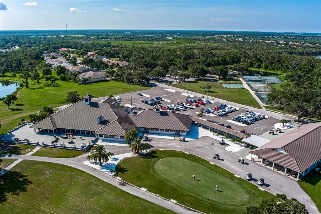 12150 Mapleridge Drive Parrish, FL 34219 - Photo 33 of 38 an aerial view of a house with a garden swimming pool and outdoor seating