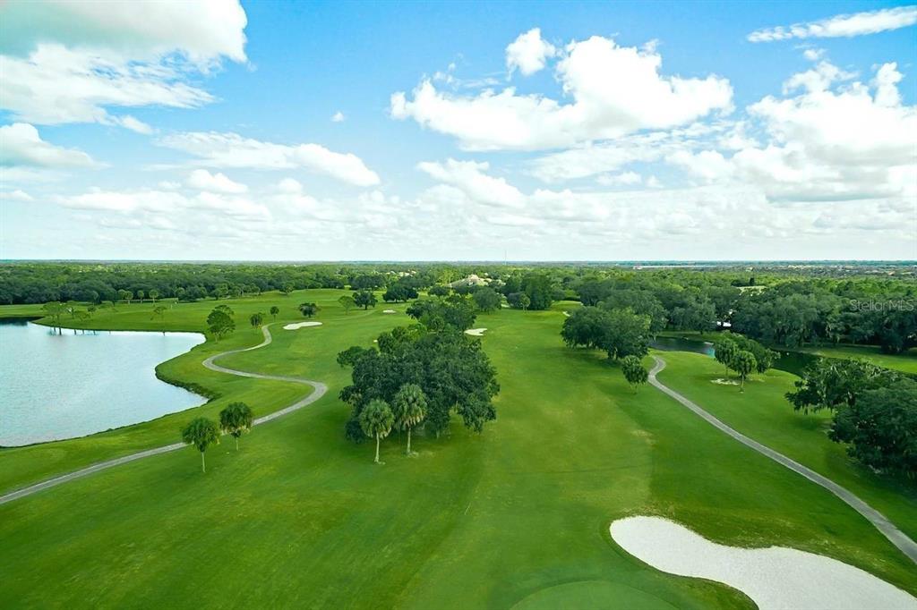 12150 Mapleridge Drive Parrish, FL 34219 - Photo 35 of 38 a view of a golf course with a garden
