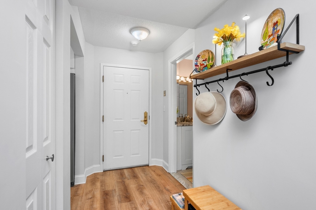 9 Park Hull Ma, Unit 505 Hull, MA 02045 - Photo 5 of 25 a view of storage and utility room with racks on the wall