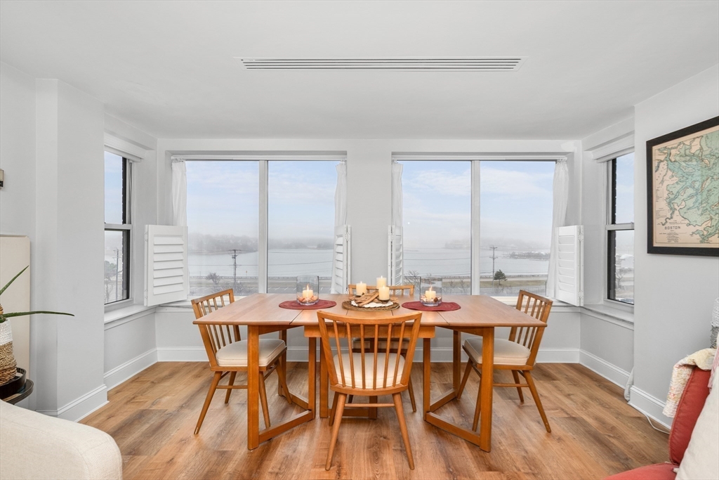 9 Park Hull Ma, Unit 505 Hull, MA 02045 - Photo 9 of 25 a view of a dining room with furniture and wooden floor
