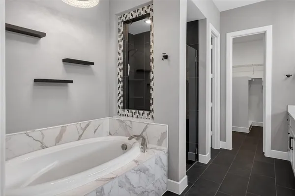a bathroom with a double vanity sink mirror and double
