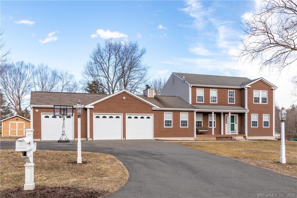 WELCOME to your NEW HOME! Beautiful outdoor lighting, large driveway, 3 car garage and a shed