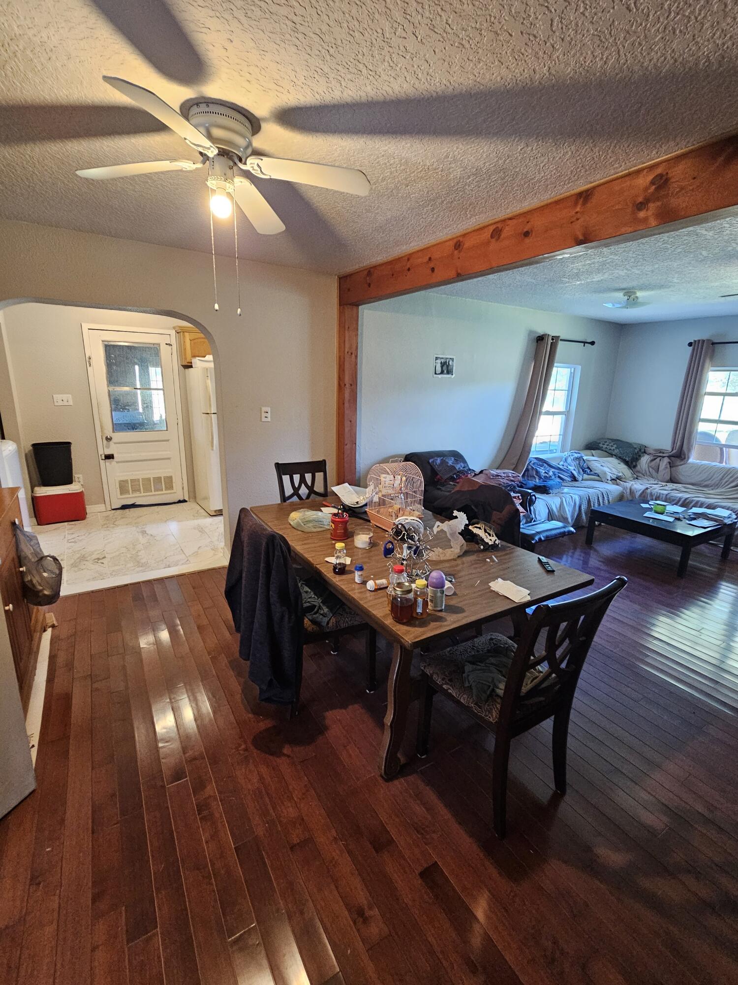 4900 Northwest 160th Street Okeechobee, FL 34972 - Photo 8 of 23 a living room with furniture and a wooden floor