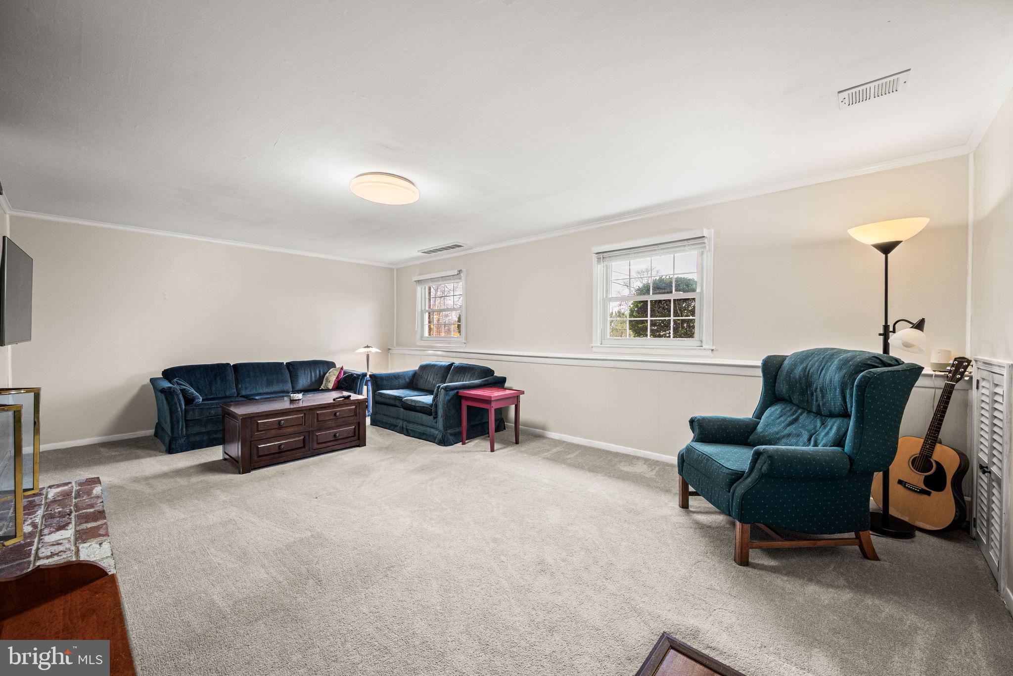 309 Saybrook Road Villanova, PA 19085 - Photo 16 of 47 a living room with furniture and a flat screen tv