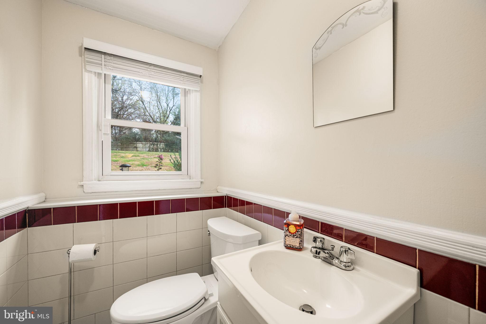 309 Saybrook Road Villanova, PA 19085 - Photo 20 of 47 a bathroom with a sink a toilet and mirror