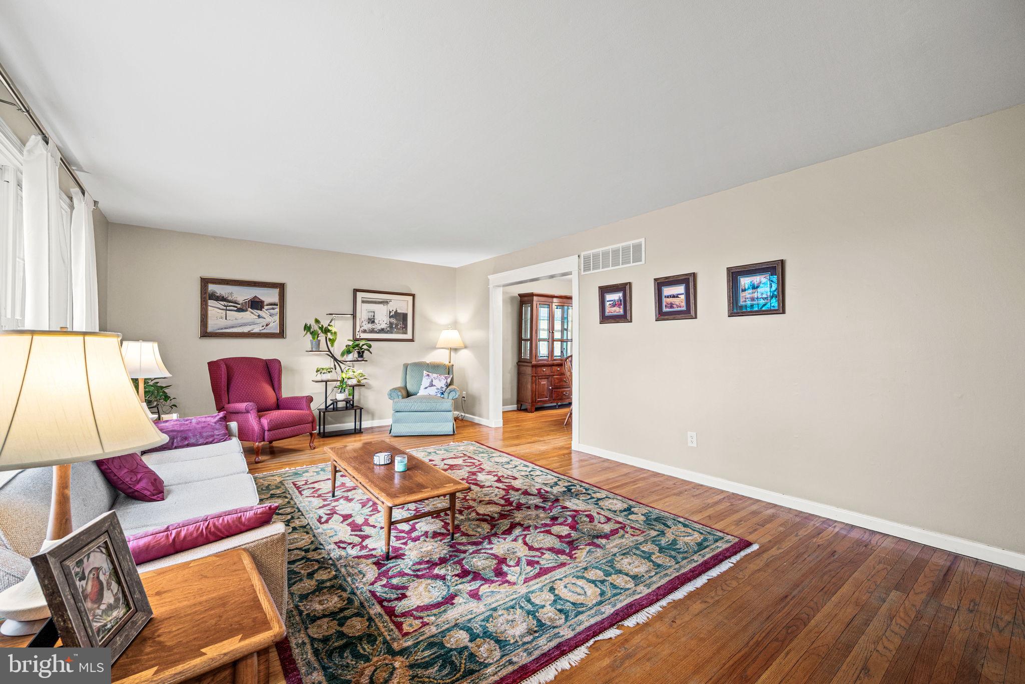 309 Saybrook Road Villanova, PA 19085 - Photo 2 of 47 a living room with furniture and a couch