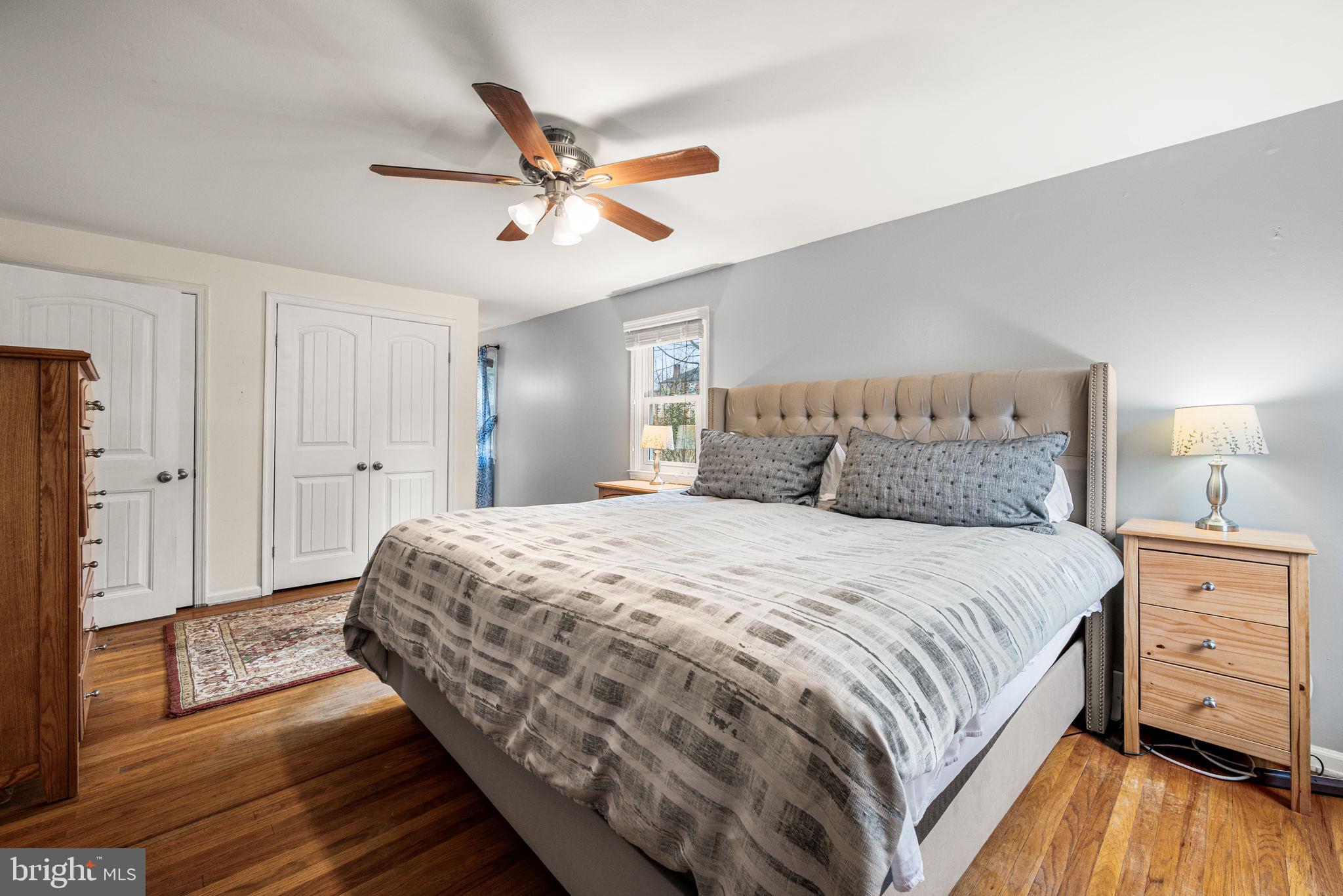 309 Saybrook Road Villanova, PA 19085 - Photo 22 of 47 a bedroom with a bed and wooden floor