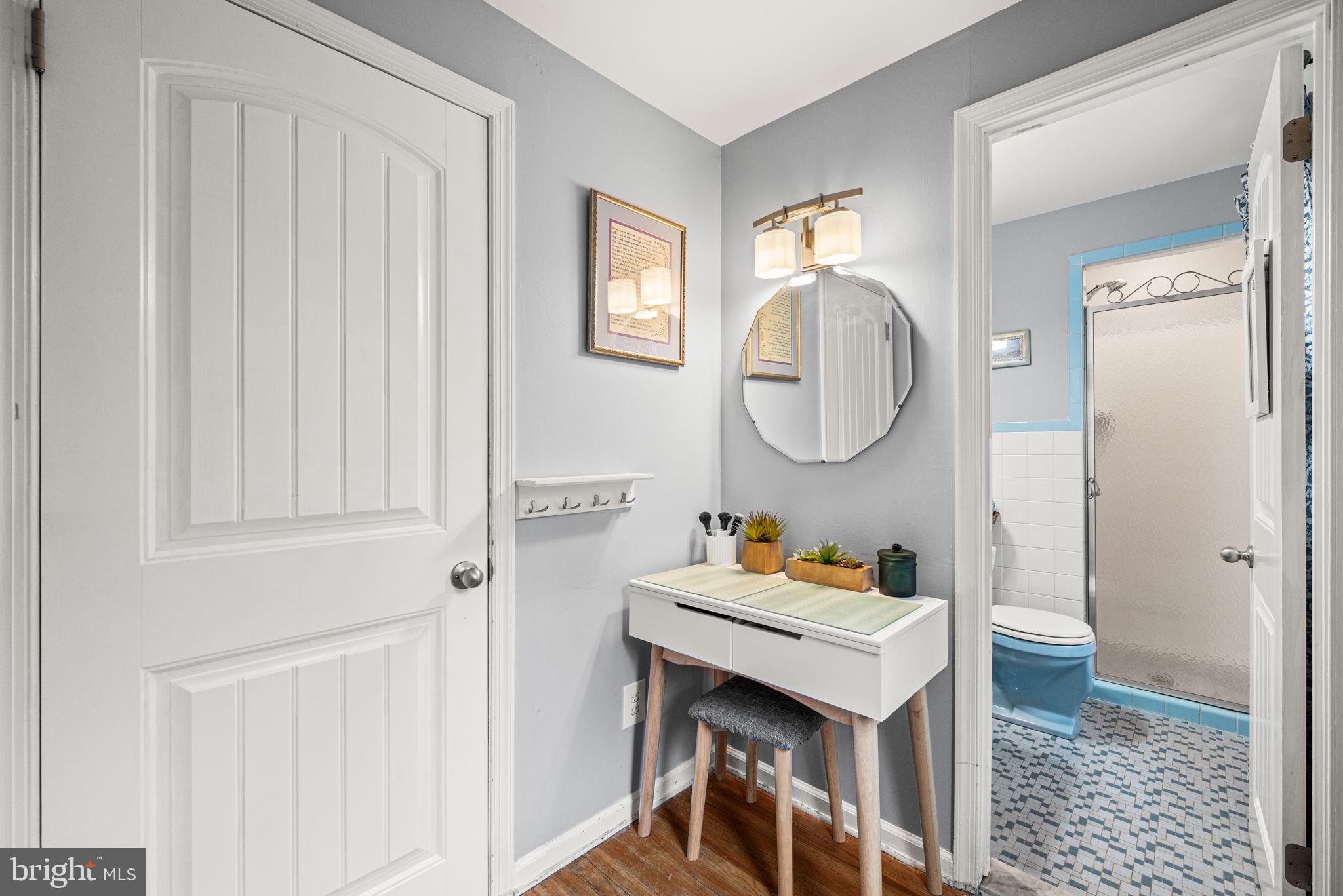 309 Saybrook Road Villanova, PA 19085 - Photo 24 of 47 a bathroom with a sink a mirror and a toilet