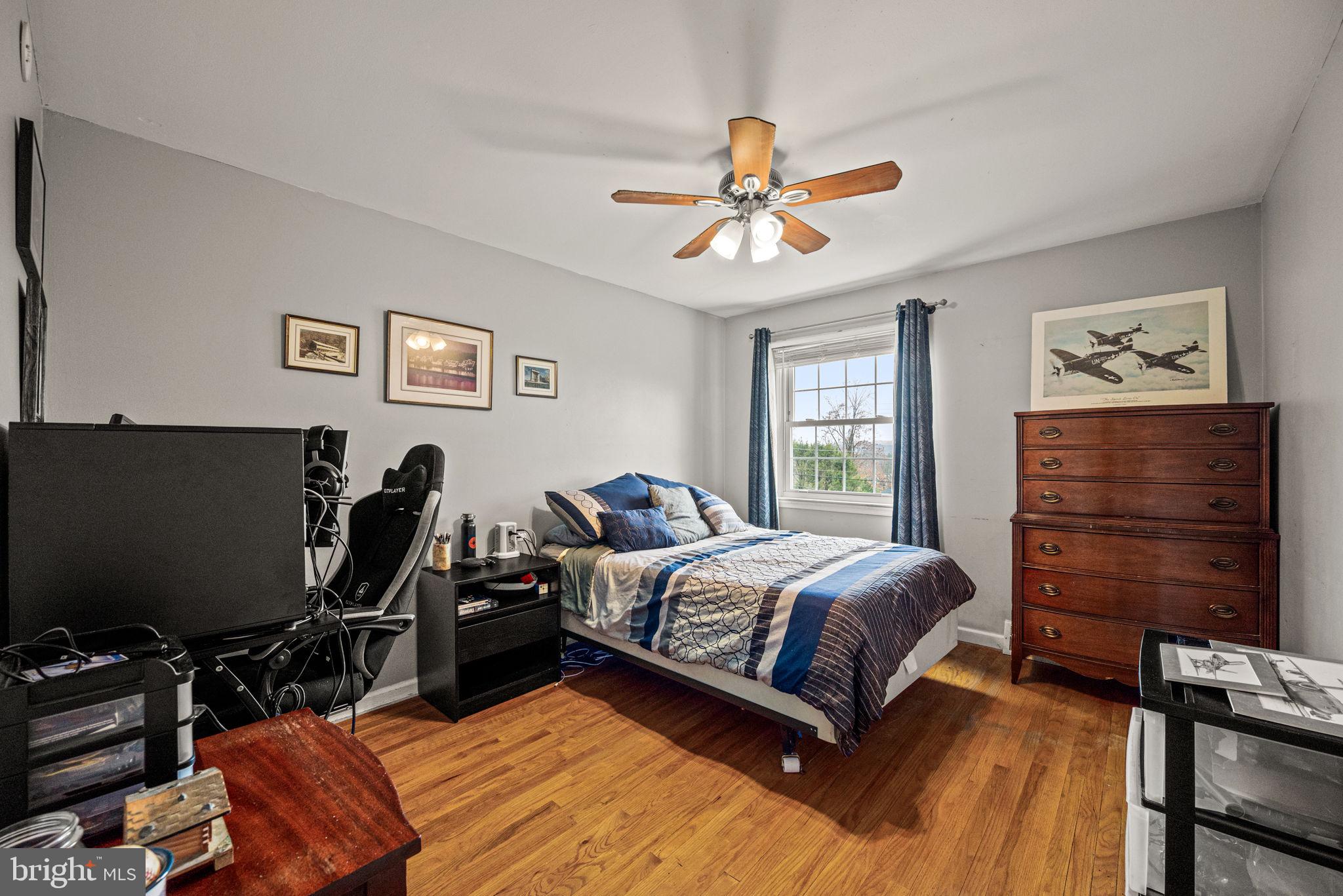309 Saybrook Road Villanova, PA 19085 - Photo 26 of 47 a bedroom with a bed and a flat screen tv