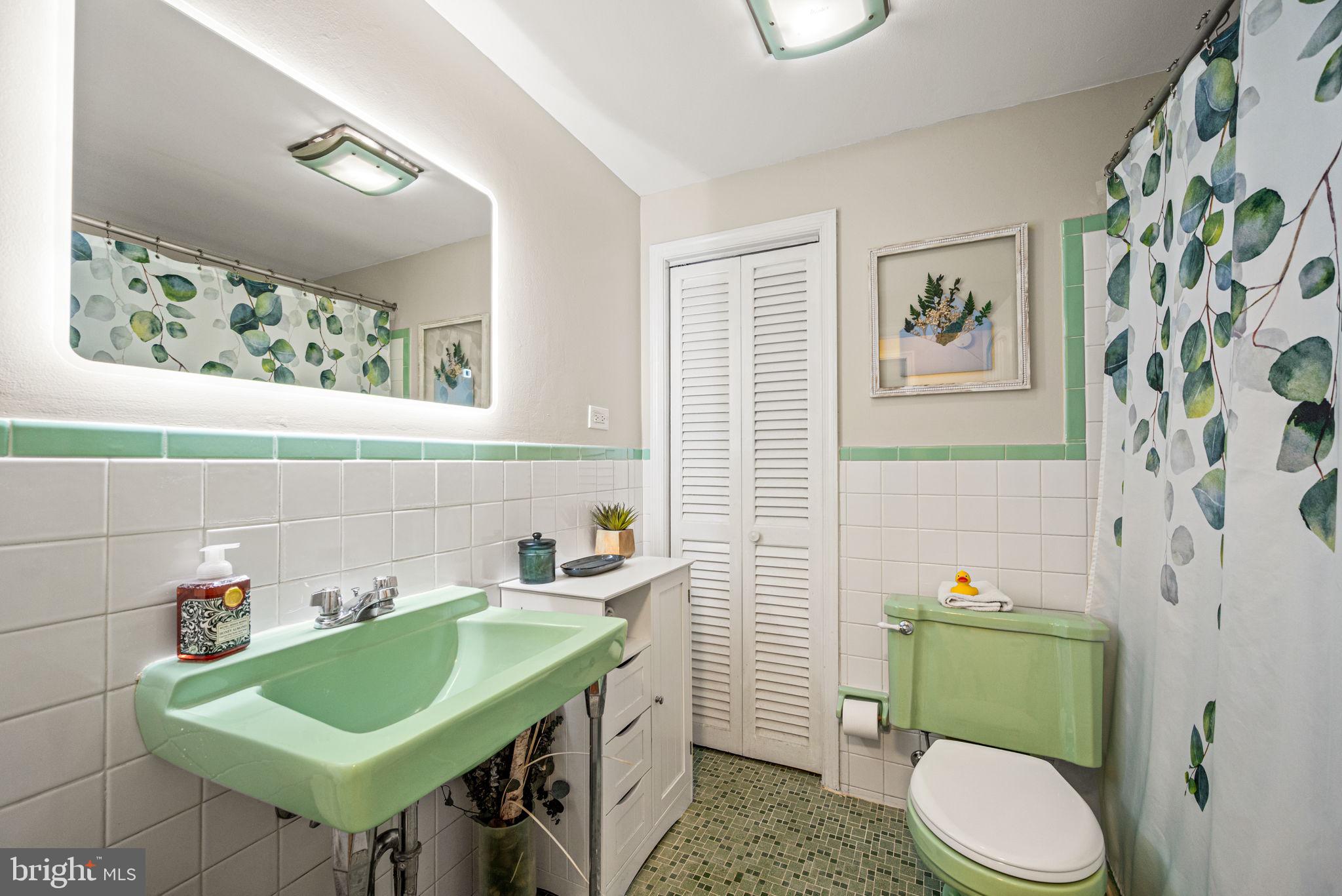 309 Saybrook Road Villanova, PA 19085 - Photo 29 of 47 a bathroom with a sink a toilet and a mirror
