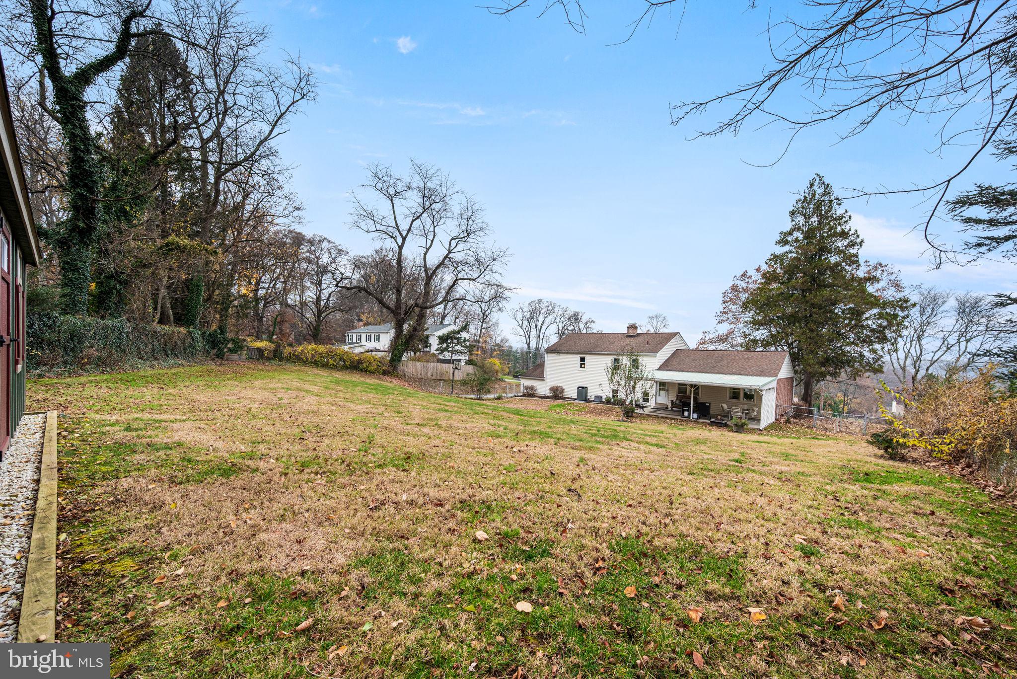 309 Saybrook Road Villanova, PA 19085 - Photo 35 of 47 a view of a yard with a house and large trees