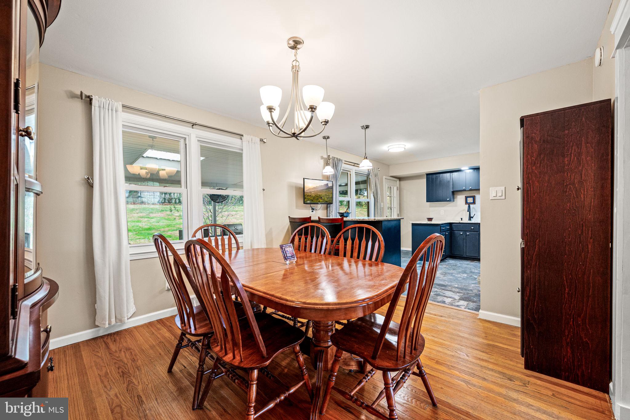 309 Saybrook Road Villanova, PA 19085 - Photo 6 of 47 a view of a dining room with furniture window and wooden floor