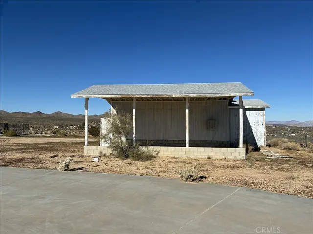 a front view of a house with a garage