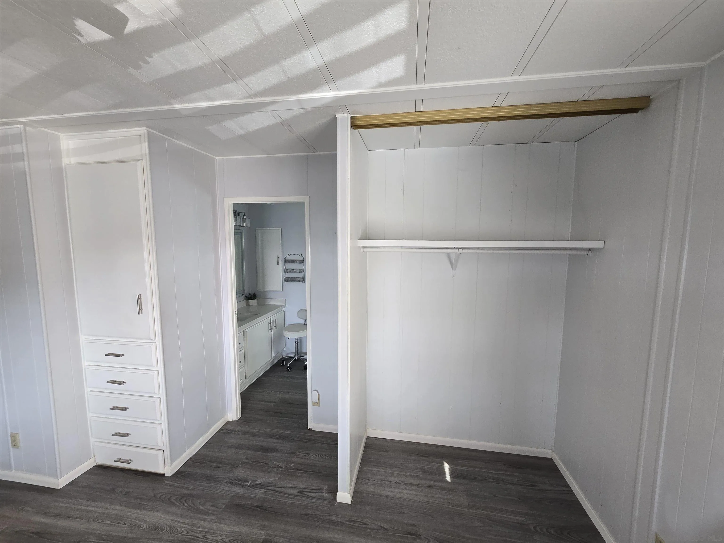 1815 Sweetwater Road, Unit SPC 120 Spring Valley, CA 91977 - Photo 16 of 49 a view of walk in closet with wooden floor
