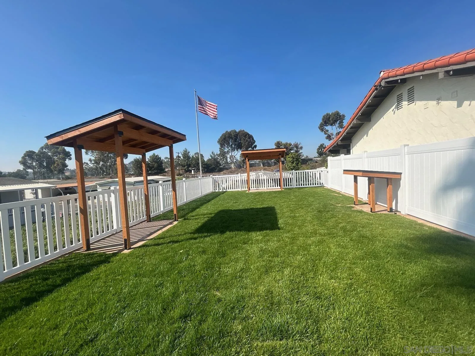 1815 Sweetwater Road, Unit SPC 120 Spring Valley, CA 91977 - Photo 29 of 49 a view of a house with a yard