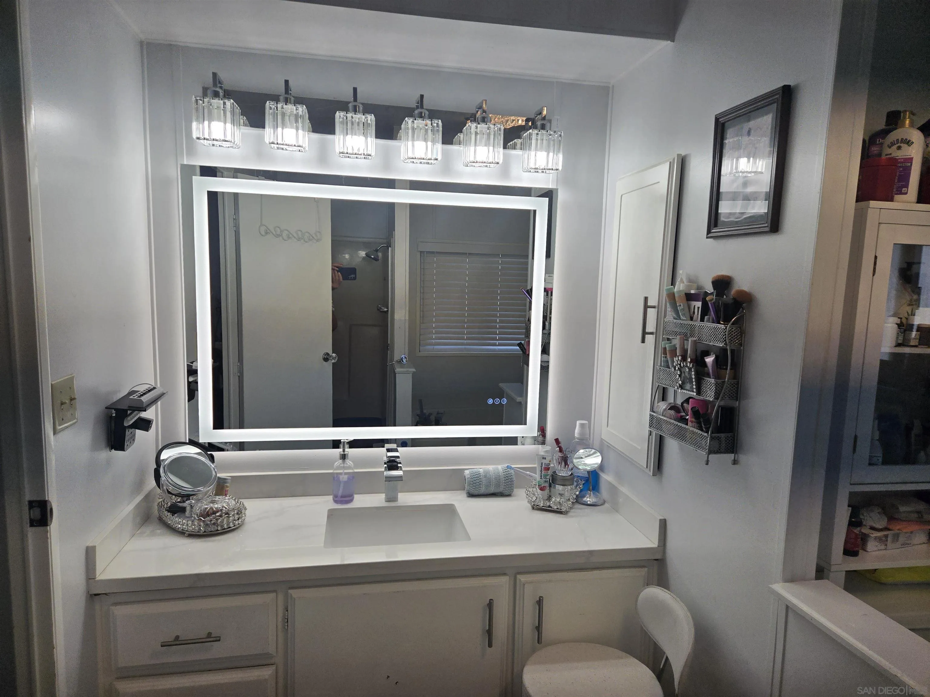 1815 Sweetwater Road, Unit SPC 120 Spring Valley, CA 91977 - Photo 37 of 49 a bathroom with a sink and a mirror
