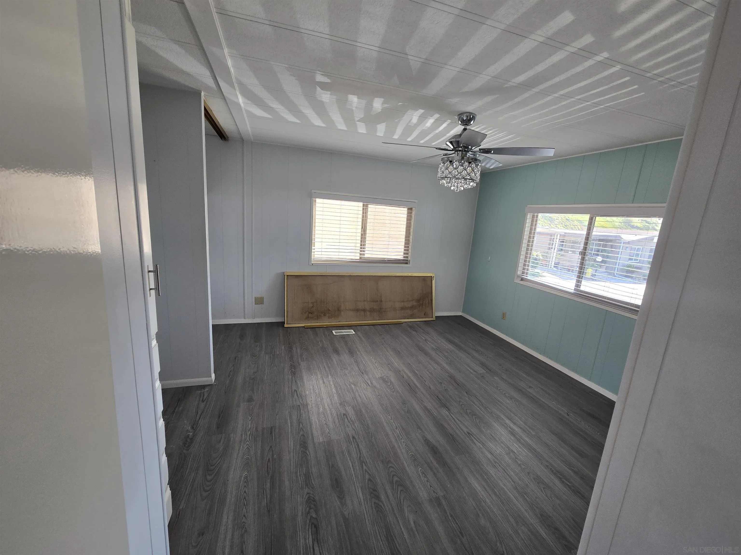 1815 Sweetwater Road, Unit SPC 120 Spring Valley, CA 91977 - Photo 43 of 49 wooden floor in an empty room with a window
