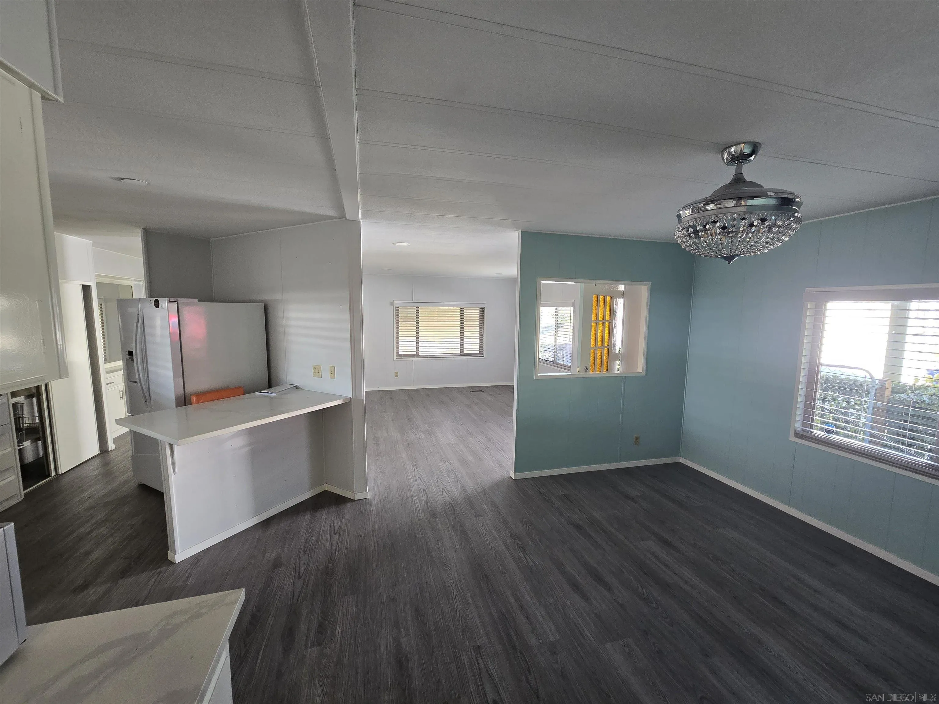 1815 Sweetwater Road, Unit SPC 120 Spring Valley, CA 91977 - Photo 6 of 49 a view of an empty room and window