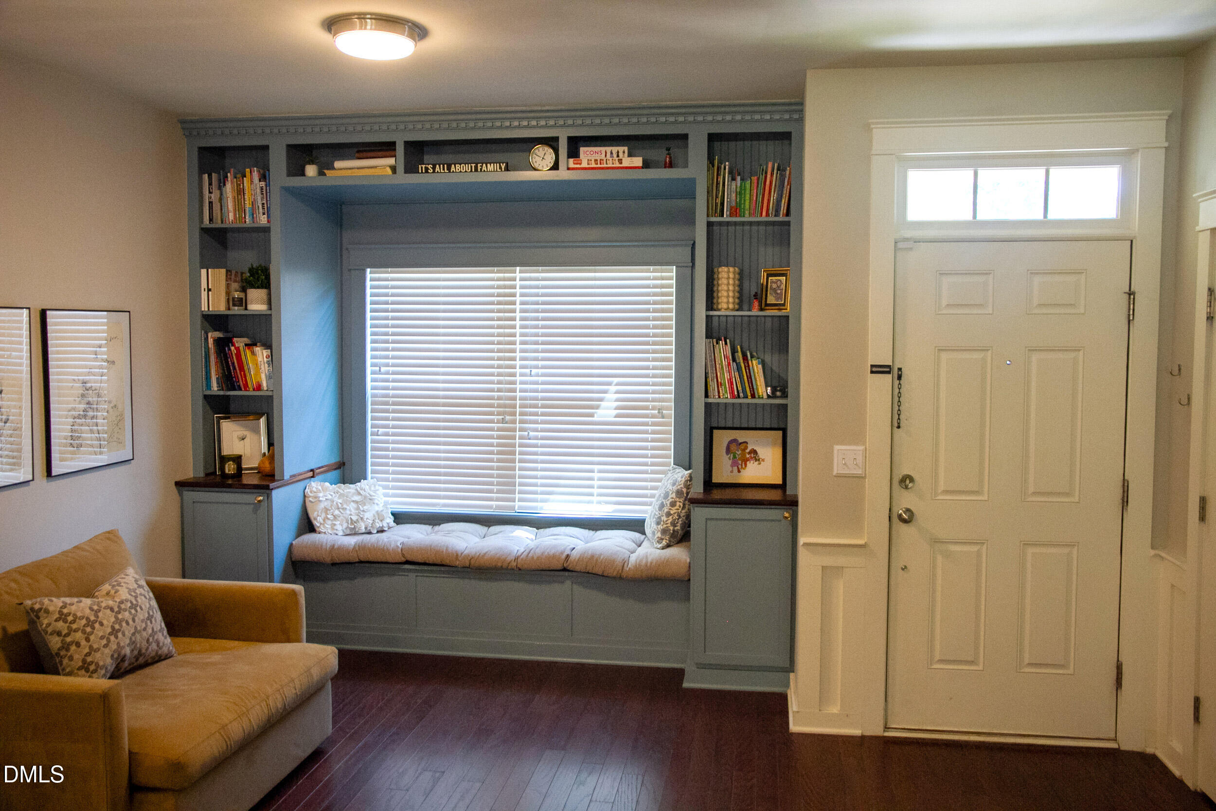 7802 Allscott Way Raleigh, NC 27612 - Photo 3 of 25 a living room with furniture and a window