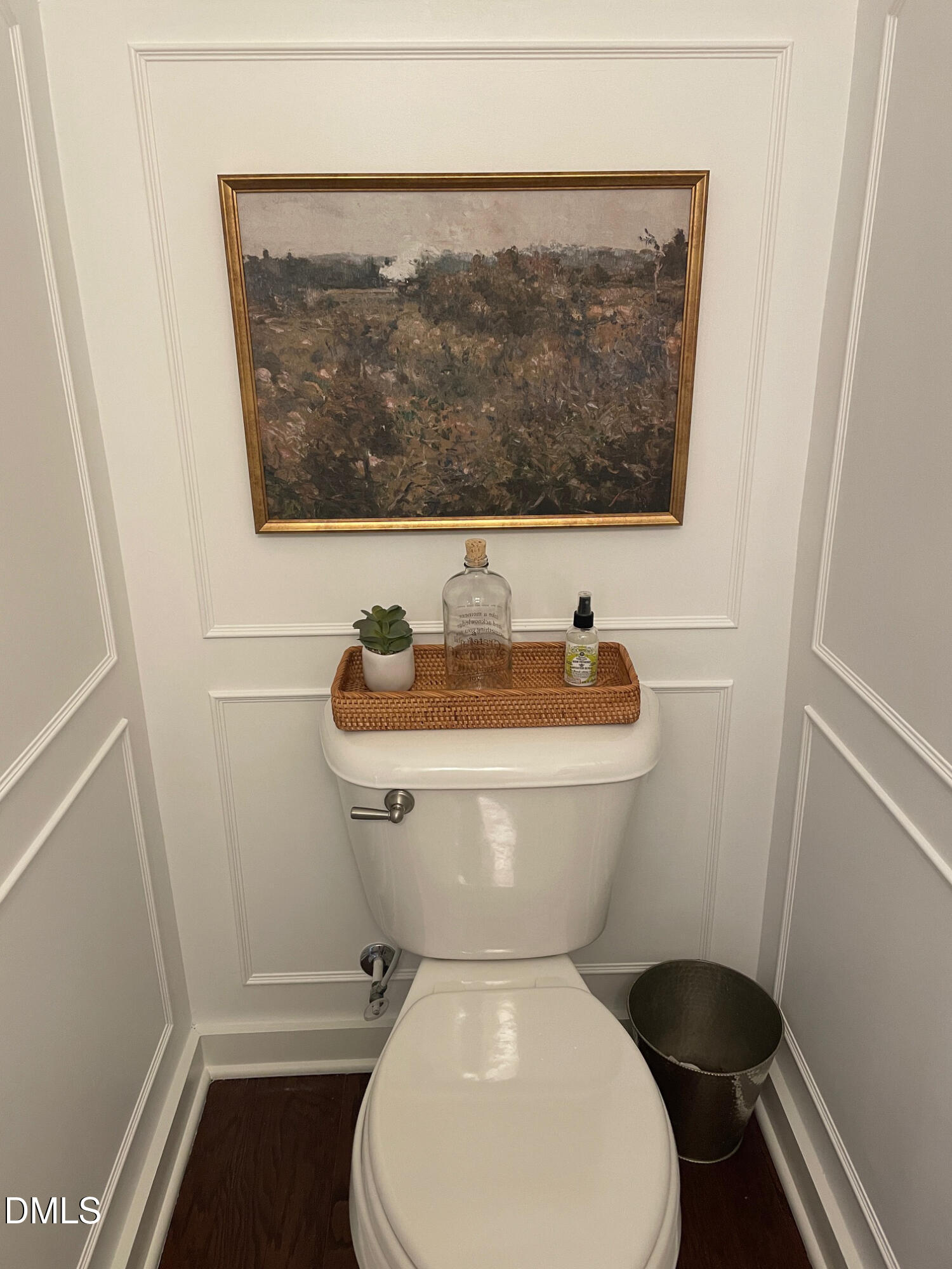 7802 Allscott Way Raleigh, NC 27612 - Photo 10 of 25 a bathroom with a toilet and a mirror