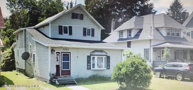 37004 Highway 23 Roxbury, NY 12434 - Photo 1 of 14 a front view of a house with garden