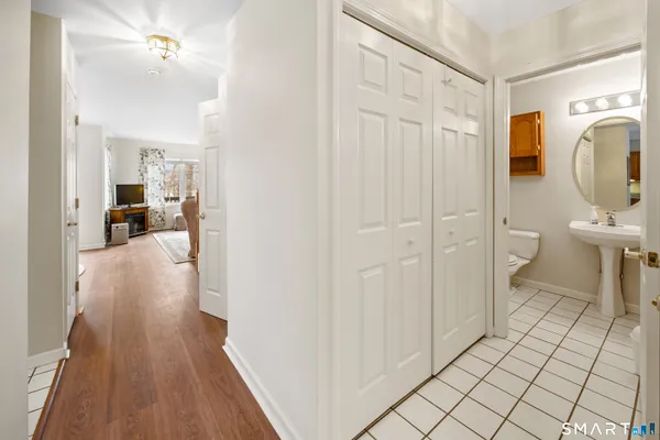a view of a bathroom from a hallway