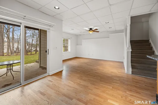 a view of a livingroom with wooden floor