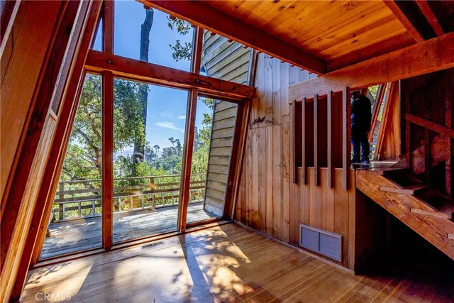a view of a room with wooden floor and iron walls