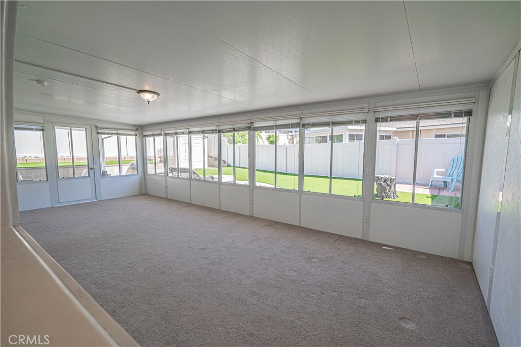 26478 Fairway Circle Newhall, CA 91321 - Photo 14 of 60 a view of an empty room with a window