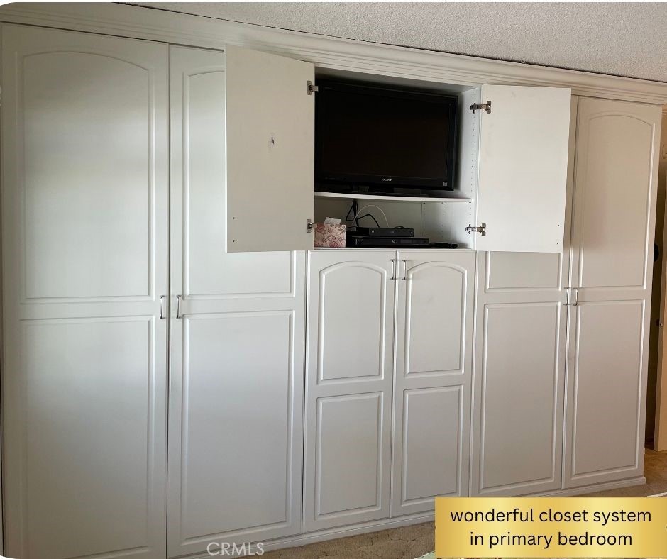 26478 Fairway Circle Newhall, CA 91321 - Photo 18 of 60 primary bedroom built-in closet system