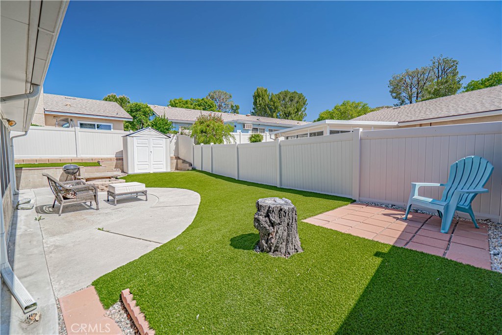 26478 Fairway Circle Newhall, CA 91321 - Photo 28 of 60 a view of a backyard with furniture