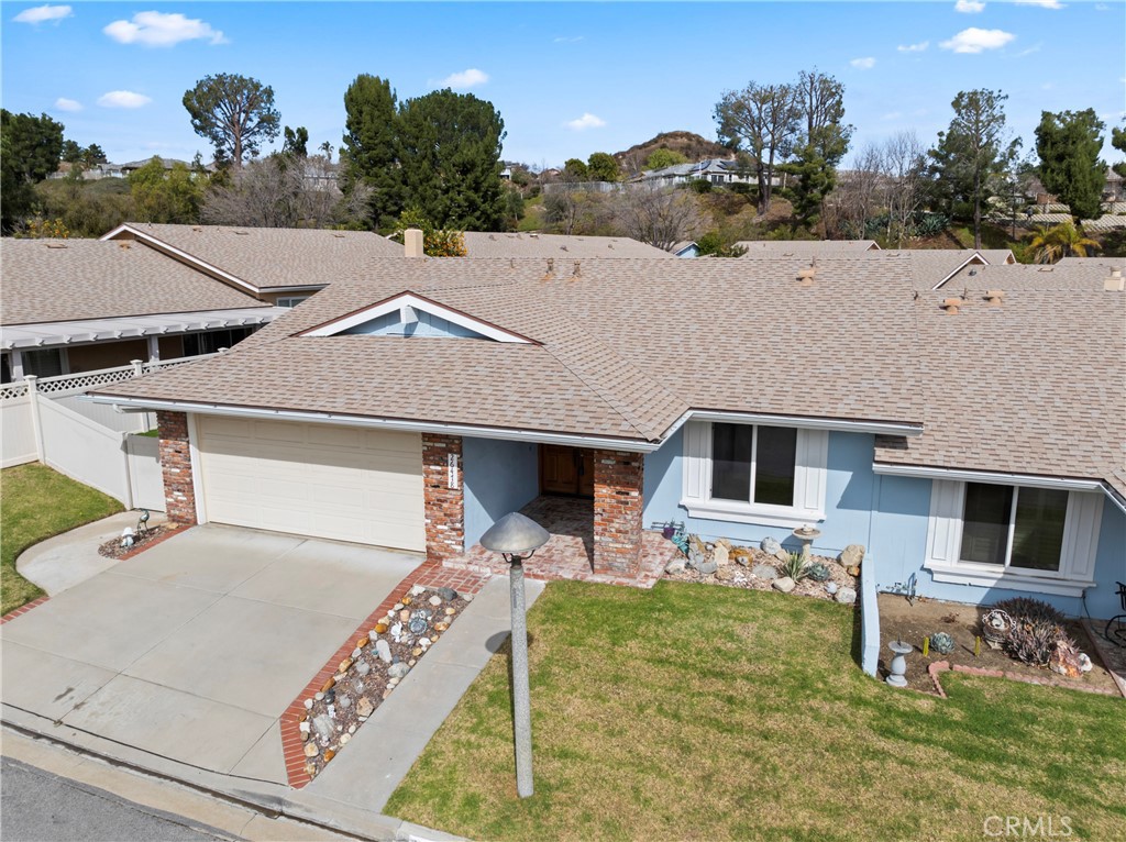 26478 Fairway Circle Newhall, CA 91321 - Photo 35 of 60 an aerial view of a house with swimming pool
