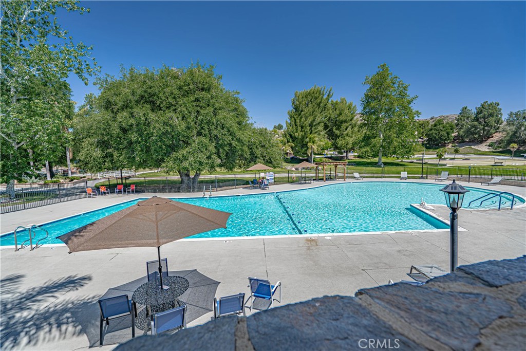 26478 Fairway Circle Newhall, CA 91321 - Photo 40 of 60 an outdoor space with furniture and a lake view