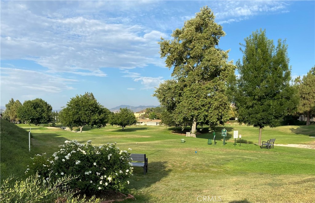 26478 Fairway Circle Newhall, CA 91321 - Photo 45 of 60 a view of a golf course with chairs