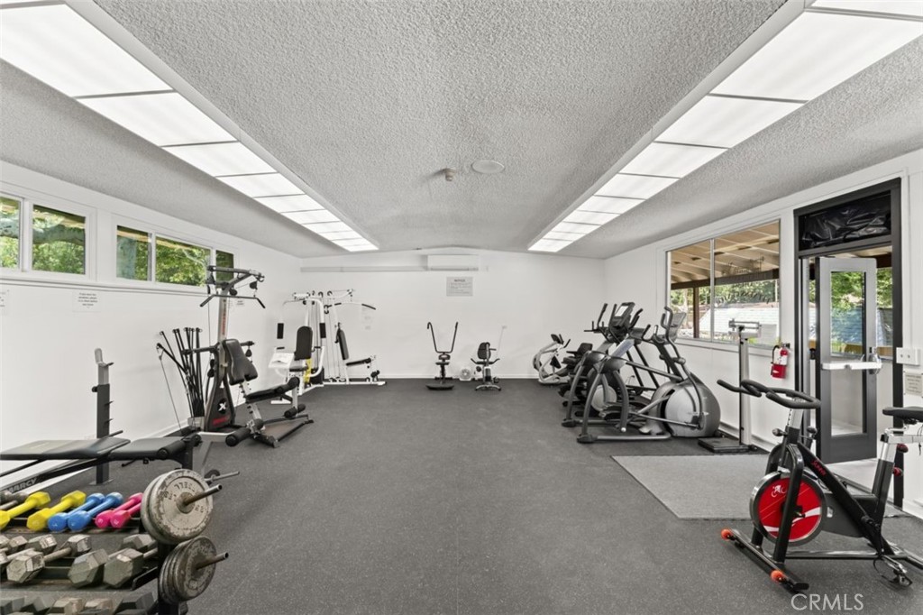 26478 Fairway Circle Newhall, CA 91321 - Photo 53 of 60 a view of a room with gym equipment