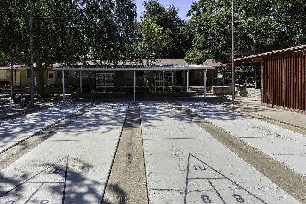 26478 Fairway Circle Newhall, CA 91321 - Photo 57 of 60 a view of a house with backyard and sitting area