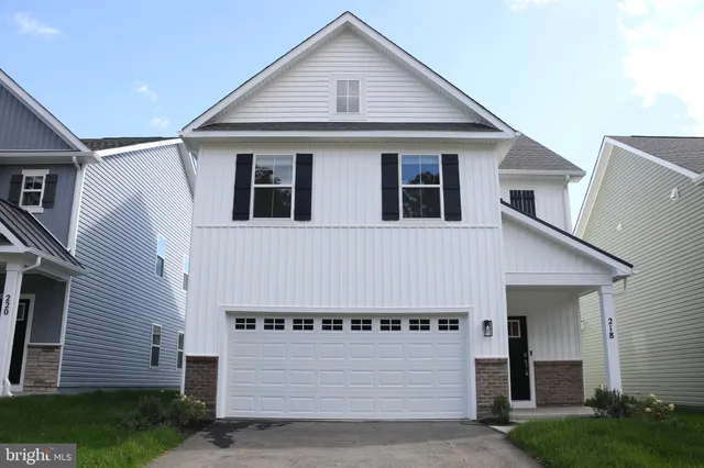 a house view with a garden space