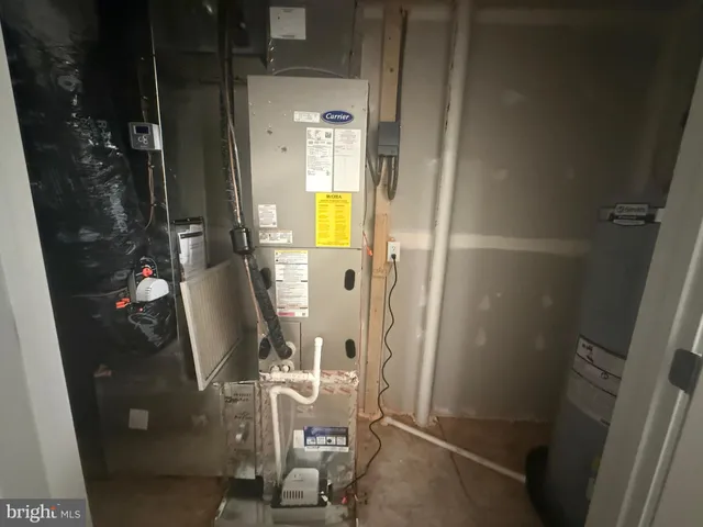 a view of a kitchen cabinets and utility room