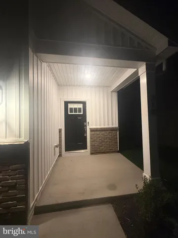 a front view of a house with garage