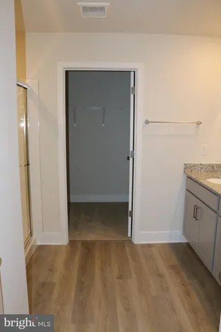 a view of hallway with shower