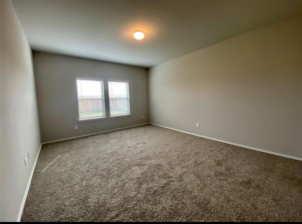 2330 Georgina Falls Drive Spring, TX 77373 - Photo 4 of 12 an empty room with a window