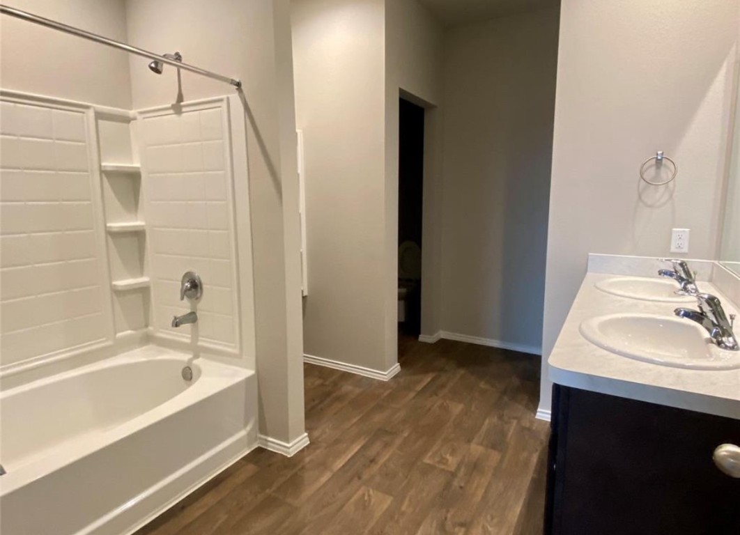 2330 Georgina Falls Drive Spring, TX 77373 - Photo 5 of 12 a bathroom with a bathtub and a sink