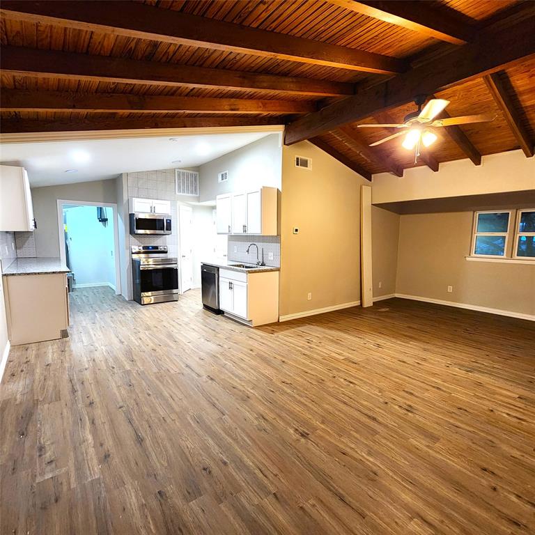 142 Andrea Street, Unit B Pottsboro, TX 75076 - Photo 6 of 22 a view of a livingroom with furniture and wooden floor