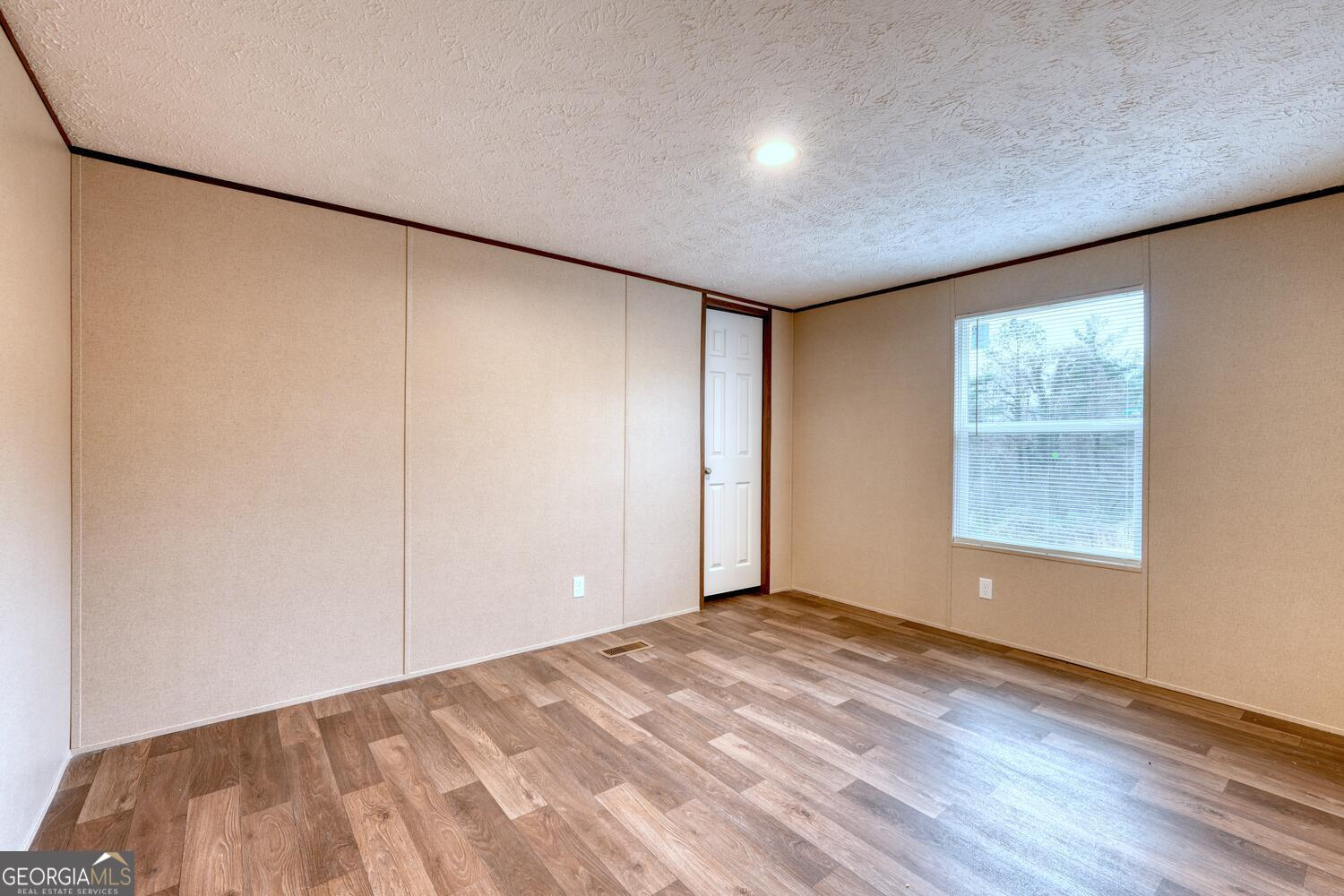 Tract B Kyle Road Blue Ridge, GA 30513 - Photo 31 of 37 a view of an empty room with wooden floor and a window