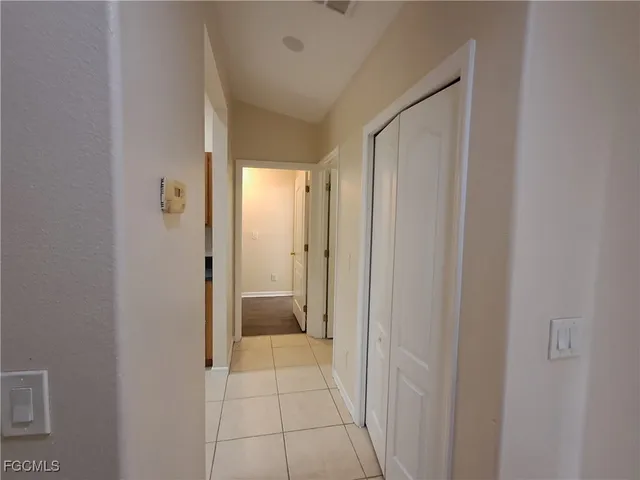 a bathroom with a shower and a sink