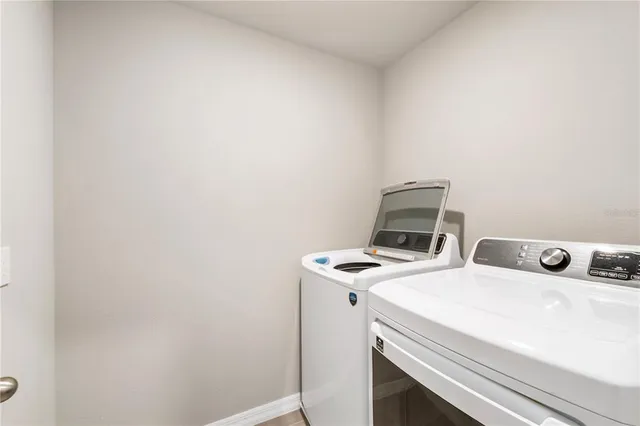 a view of empty room with windows